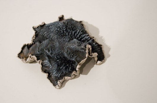 Ying-Hsun (Zita) Hsu - Brooch (2013). Brass, iron magnetized, epoxy resin. Photo by Eleni Roumpou