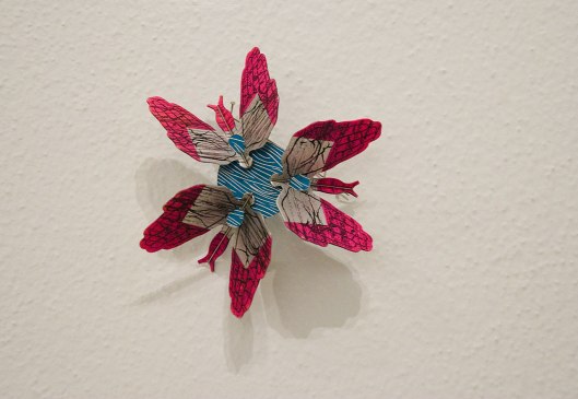 Mei-Fang Chiang - Brooch (2013). Anodized aluminium, ink, paint, stainless steel wire, toner. Photo by Eleni Roumpou